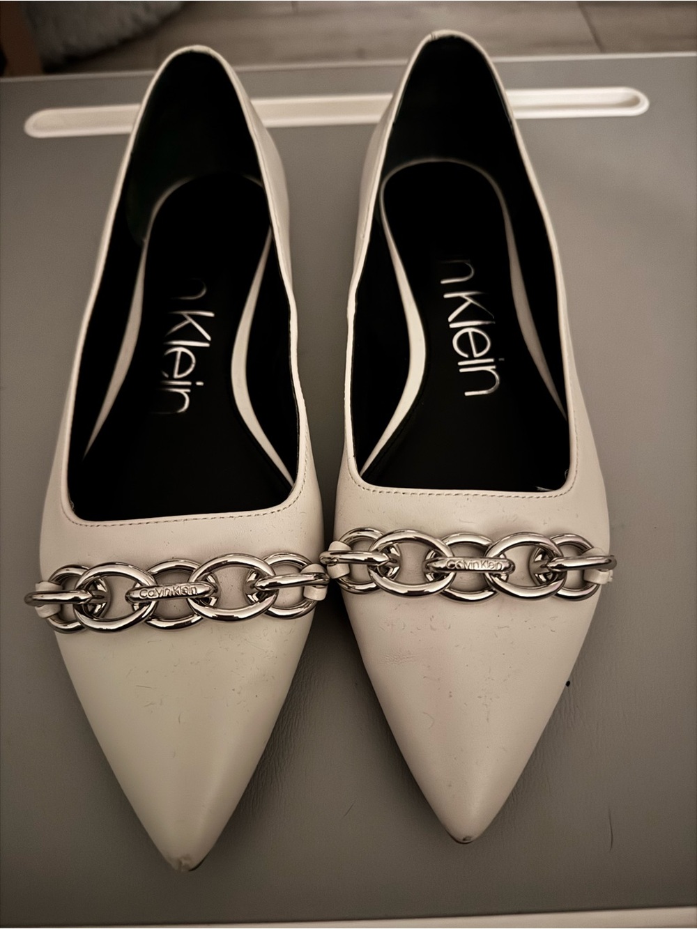 Calvin Klein Ivory Pointed Leather Flats with Silver Chain Accent